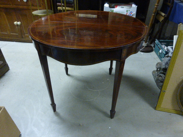 19th century Mahogany Demi-lune Fold Over Tea Table on square tapering legs