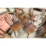 Three Ercol Hoop back Dining Chairs and a similar Stickback Chair