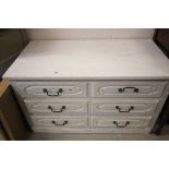 A Low Painted Chest of Three Long Drawers