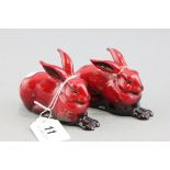 Two Royal Doulton 'Flambe' Rabbits (one a/f)