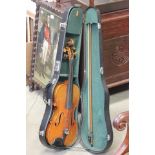 Early 20th century Cased Violin with a two piece back with signed bow