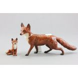 Beswick Seated Fox, model no. 1748 and a Beswick Standing Fox, model no.1016A