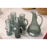Small Blue Crackle Glass Jug together with Six Matching Tot Mugs