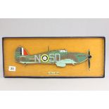 Boxed Hurricane mounted on a Wooden Plinth