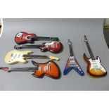 Six Miniature Guitars