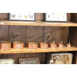 Set of Vintage Seven Graduating Copper and Iron Handled Saucepans