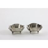 Pair of Silver Salt, square form with fluted edges each raised on four ball feet, Birmingham 1902