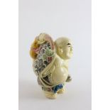 Oriental figure of a Travelling Buddha