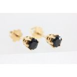 Pair of 18k Gold Earrings, each set with a single sapphire