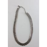 Cased Silver Necklace comprising linked square panels