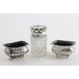 Pair of Silver Salt Cellars, with half reeded bodies raised on four ball feet, Chester 1887 together