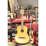 Child's Accoustic Guitar and another Guitar and Comet Keyboard Blow Instrument