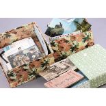 Plastic container with 3 boxes of postcards of the world some vintage some modern