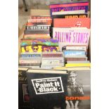 Quantity of various The Rolling Stones related books mainly hardback plus 15 RS videos