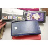 Red stamp album with a quantity of world stamps used & hinged plus 2 FDI Cover albums with