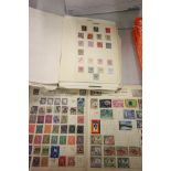 2 Stamp albums with world stamps, used & hinged