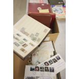 Three stock books and a stamp album with world stamps used hinged plus a shoebox with a quantity