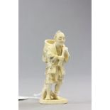 Continental Ceramic Figure in the form of an Ivory Okimono