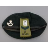 Military Cap with Regimental Badge and an Armband