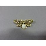 18ct Yellow Gold Brooch in the form of a Moth set with Opal, Peridot, Diamond and Seed Pearl