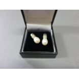 Pair of White Gold Dreshwater Pearl and Diamond Earrings