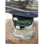 Irish Guards Military Cap and a Military Combat Helmet