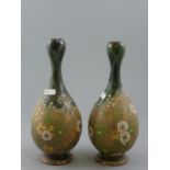 Pair of Doulton Lambeth Stoneware Bottle Neck Vases