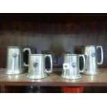 Four Pewter Presentation Tankards each with Enamel Motor Racing plaque awarded to R A Kellow at
