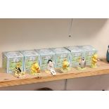 Six Boxed Royal Doulton 'The Winnie the Pooh Collection' Figures - Winnie the Pooh The Present,