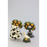 Four cast iron Doorstops including two Orange Trees, a goose and pigs