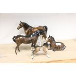 Two Royal Doulton Horses plus a Royal Doulton Pony and one other similar