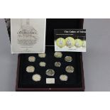 Cased set of The Coins of Britannia's Last Century gold and platinum edition from The London Mint