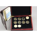 Case with ten House of Windsor commemorative coins with paperwork in separate file