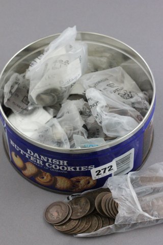 Tin of mainly UK coins including silver