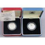 Two UK Silver Proof £1 Coins including one in red box with paperwork and one in blue box without
