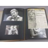 Large scrapbook of Derek Jacobi including many black and white press photos, good condition