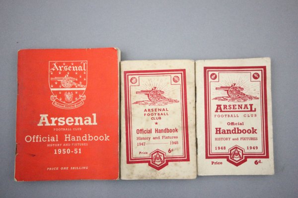 Three Arsenal handbooks including 1947/48, 1948/49 and 1950/51 (some writing and marks but overall
