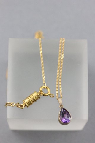 9ct Gold Tear Shaped Pendant set with Amethyst on 9ct Gold Chain