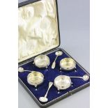 Set of Four George III Silver Salts, each with gadrooned edge and three pad feet, London 1774