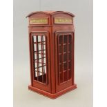 Tin plate money box in the form of a red Telephone Box