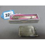 Silver Needlecase together with a Miniature Silver Cased Notebook with Pencil