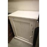 White Painted Cupboard with single panel door and attached towel rail to side