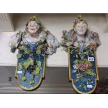 Pair of Majolica Plaques, one of Bacchus with Dead Birds and the other of a Maiden with Living