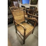 Early 20th century Walnut Low Elbow Chair with Bergere Seat