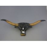 Metal Plaque in the form of a Buffalo Head with Horns