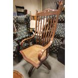 Eraly 20th century Mahogany High Back Swivel Office Elbow Chair with bergere seat