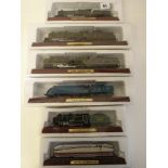 Six Collectable Model Locomotive models on stands in original packaging