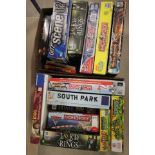 Two boxes of TV related board games including Teenage Mutant Ninja Turtles x 2, Lord of The Rings,