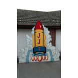 Large hand painted wooden theatrical stage prop of a rocket, in five pieces approximately 8'x8'