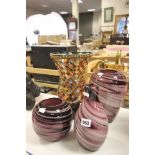 Three Purple Swirl Glass Vases and a Multi Glass Panel Candle Holder